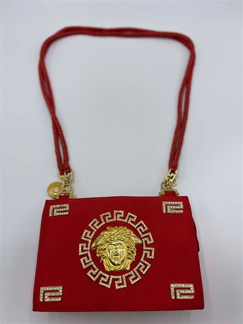 versace red bag.